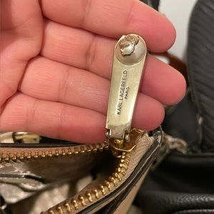 Karl purse comes with cross body strap